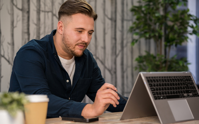 Man using a Galaxy laptop