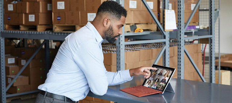 Work working on a laptop