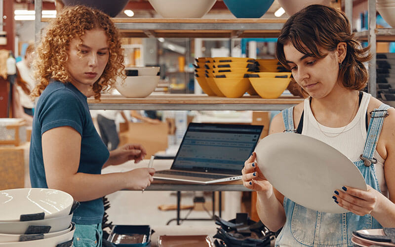 Two woman working together